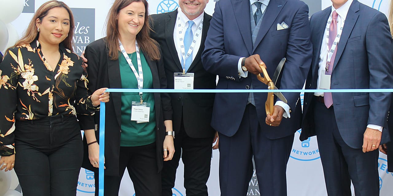 The DEC Network Unveils New Sign Announcing Naming Rights Partnership with Charles Schwab Bank